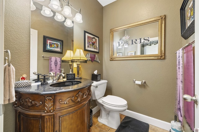 124 Hughes Rd, Benton, KY 42025 - bathroom featuring toilet, tile patterned flooring, vanity, and baseboards