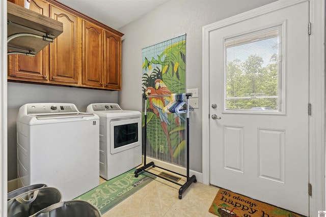 124 Hughes Rd, Benton, KY 42025 - laundry area featuring washing machine and dryer and cabinet space