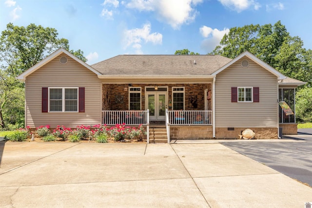 124 Hughes Rd, Benton, KY 42025 - ranch-style house with a porch, french doors, a shingled roof, and crawl space