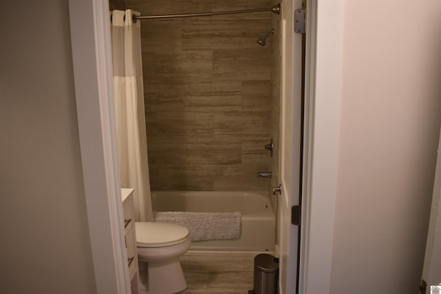 3975 Contest Rd, Paducah, KY 42001 - full bath with vanity, toilet, shower / bath combo, and wood finished floors