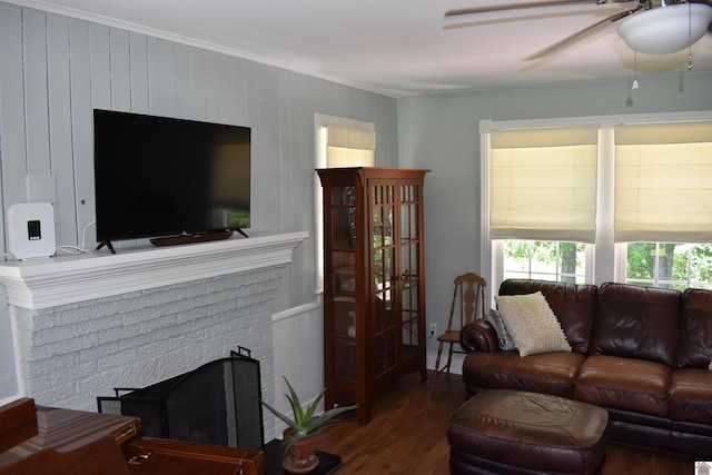 3975 Contest Rd, Paducah, KY 42001 - living room featuring wood finished floors, a ceiling fan, a fireplace, and crown molding