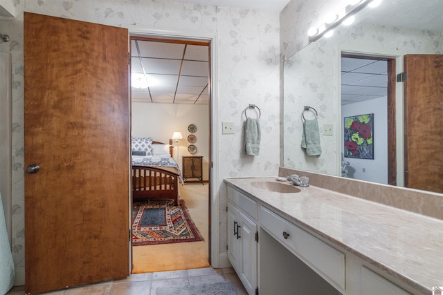 3011 Little Bear Hwy, Gilbertsville, KY 42044 - bathroom featuring vanity, tile patterned flooring, and wallpapered walls