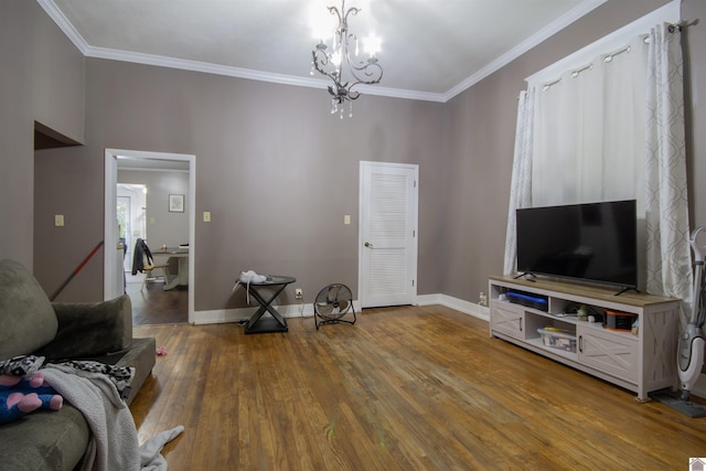 1641 Harrison, Paducah, KY 42001 - living area with wood finished floors, a chandelier, ornamental molding, and baseboards