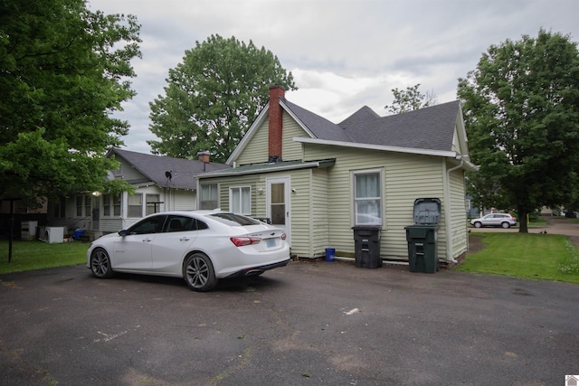 1641 Harrison, Paducah, KY 42001 - view of front of property featuring a chimney and a shingled roof