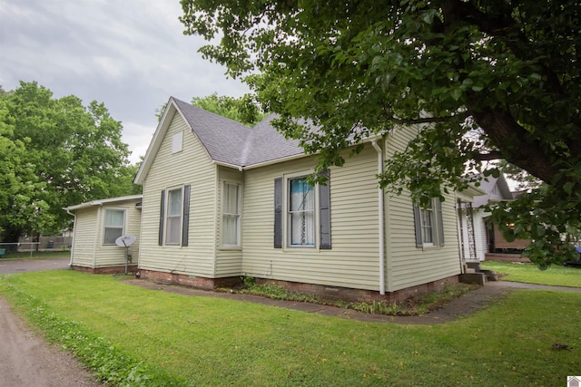 1641 Harrison, Paducah, KY 42001 - view of side of home with a yard, roof with shingles, and crawl space