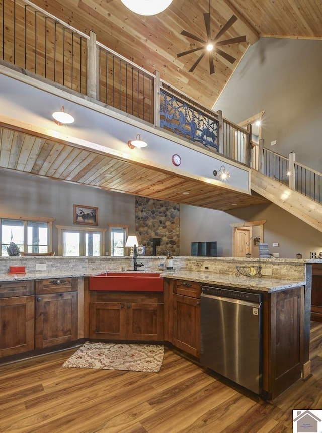 3210 Douglas Rd, Murray, KY 42071 - kitchen featuring dishwasher, a sink, high vaulted ceiling, wooden ceiling with exposed beams, and wood finished floors