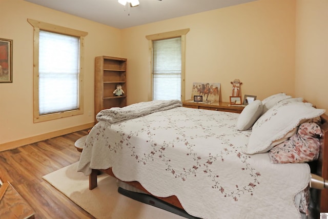 3210 Douglas Rd, Murray, KY 42071 - bedroom with wood finished floors, baseboards, and ceiling fan