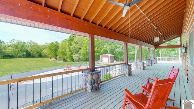 3210 Douglas Rd, Murray, KY 42071 - wooden deck featuring ceiling fan and a yard