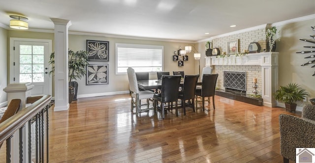 114 Shadyside Ln, Gilbertsville, KY 42044 - dining room featuring plenty of natural light, crown molding, hardwood / wood-style floors, and recessed lighting