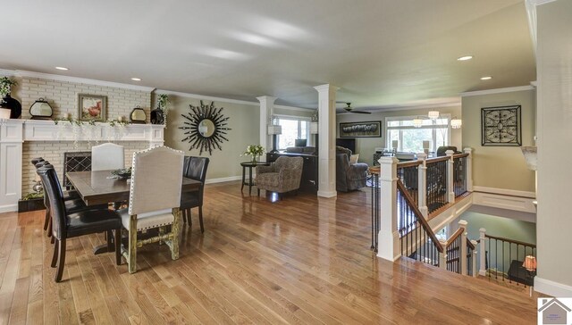 114 Shadyside Ln, Gilbertsville, KY 42044 - dining room with light wood-type flooring, crown molding, baseboards, recessed lighting, and ceiling fan