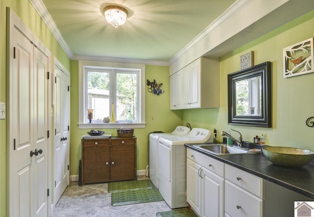 114 Shadyside Ln, Gilbertsville, KY 42044 - laundry area with washing machine and clothes dryer, cabinet space, ornamental molding, and baseboards