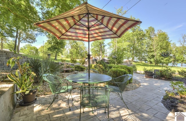 114 Shadyside Ln, Gilbertsville, KY 42044 - view of patio featuring outdoor dining space