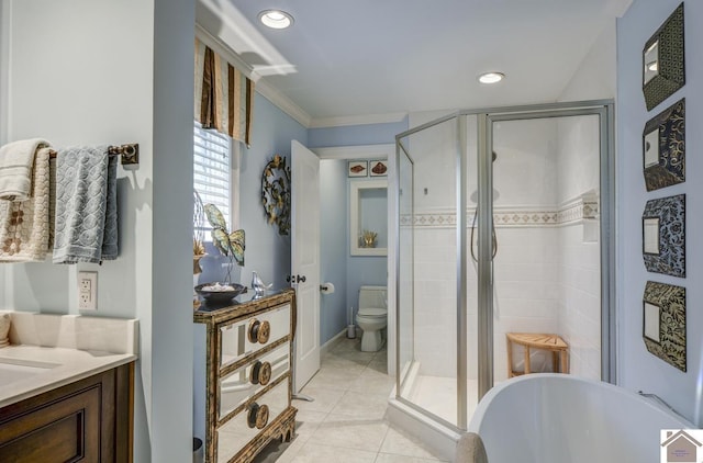 114 Shadyside Ln, Gilbertsville, KY 42044 - bathroom with a soaking tub, a stall shower, vanity, tile patterned floors, and toilet