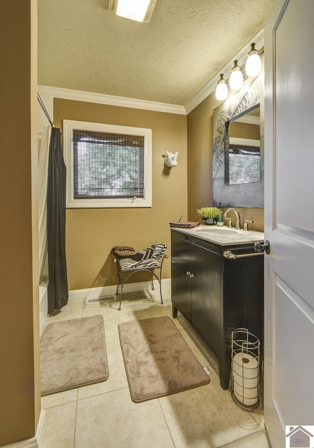 114 Shadyside Ln, Gilbertsville, KY 42044 - full bathroom with crown molding, vanity, tile patterned flooring, shower / tub combo with curtain, and baseboards