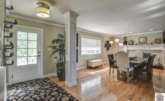 114 Shadyside Ln, Gilbertsville, KY 42044 - dining space with light wood-style floors, ornate columns, ornamental molding, baseboards, and recessed lighting
