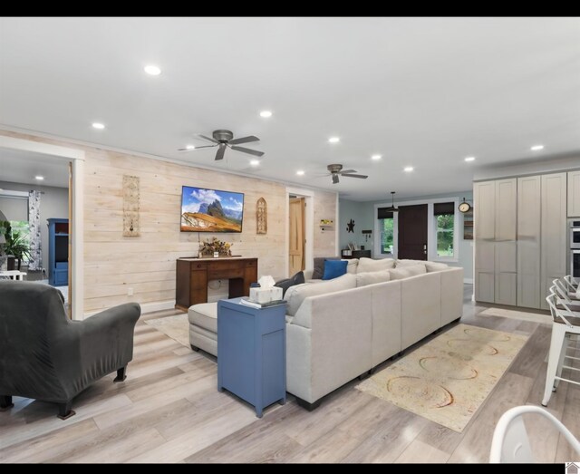 34 Navajo Ct, Cadiz, KY 42211 - living room with ceiling fan, recessed lighting, light wood-type flooring, and wood walls