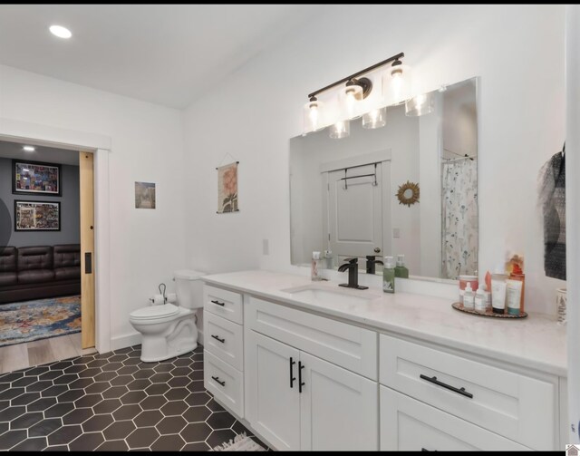 34 Navajo Ct, Cadiz, KY 42211 - bathroom with vanity, toilet, and recessed lighting