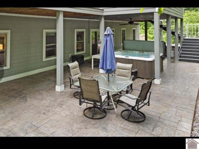 34 Navajo Ct, Cadiz, KY 42211 - view of patio / terrace featuring a hot tub, ceiling fan, outdoor dining space, and stairs
