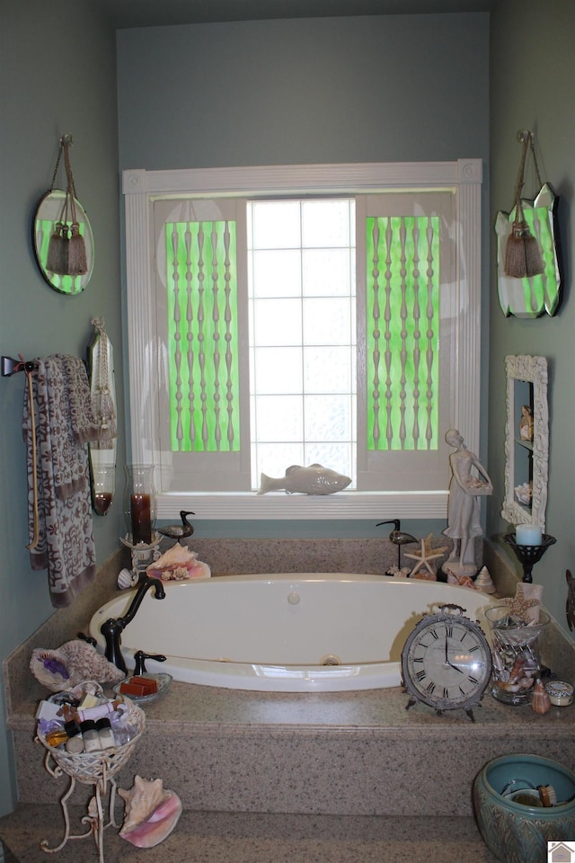 395 Wildcat Trce, Paducah, KY 42003 - bathroom featuring plenty of natural light and a whirlpool tub