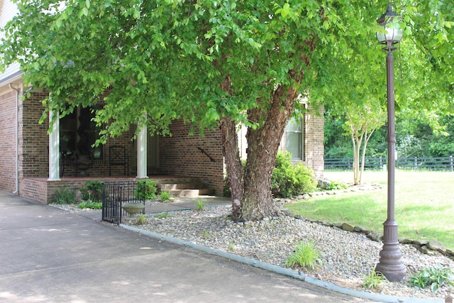395 Wildcat Trce, Paducah, KY 42003 - view of front of home with brick siding and a porch