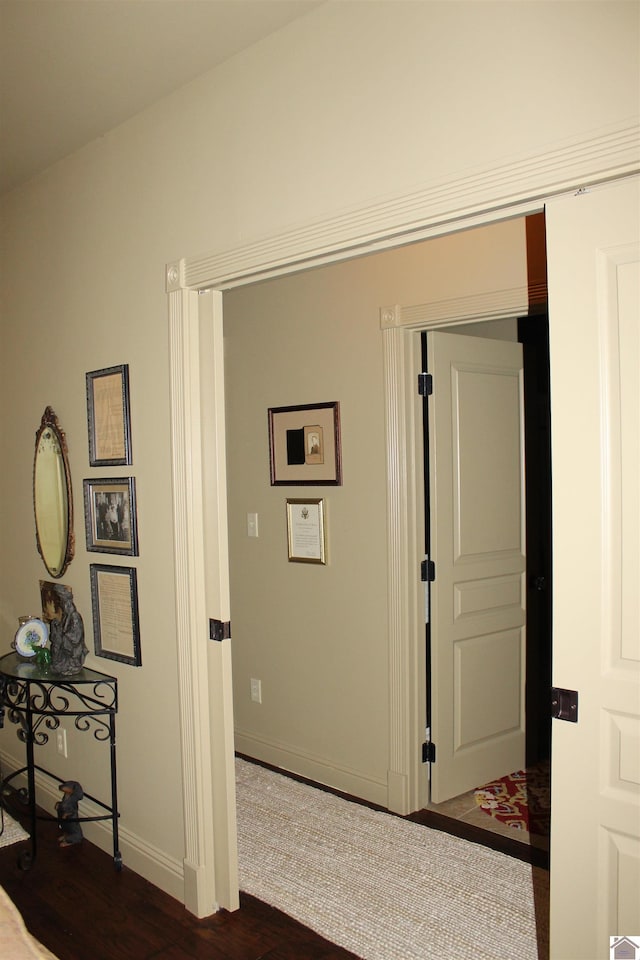 395 Wildcat Trce, Paducah, KY 42003 - hall featuring baseboards and dark wood-style flooring