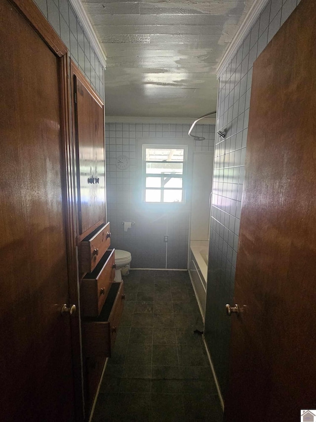 6694 State Line Rd E, Hazel, KY 42049 - full bathroom with toilet, washtub / shower combination, and ornamental molding