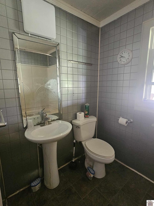6694 State Line Rd E, Hazel, KY 42049 - half bathroom featuring tile walls, ornamental molding, tile patterned floors, and toilet