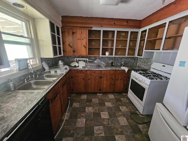 6694 State Line Rd E, Hazel, KY 42049 - kitchen with white appliances, open shelves, a sink, brown cabinets, and decorative backsplash