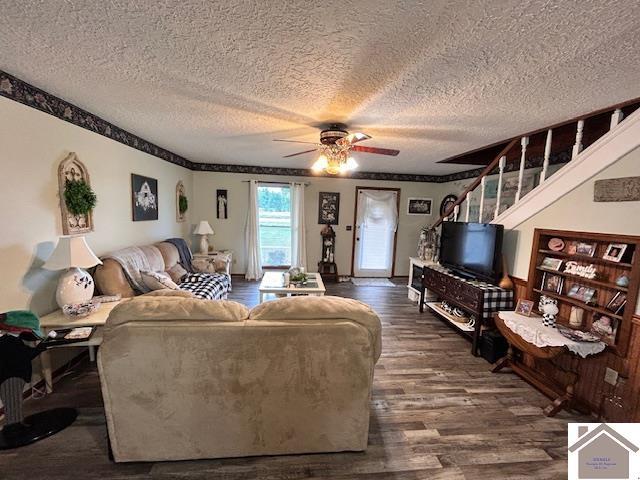 5812 State Route 123, Arlington, KY 42021 - living room with a ceiling fan, dark wood finished floors, and a textured ceiling