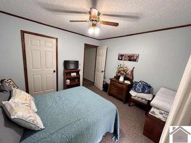 5812 State Route 123, Arlington, KY 42021 - carpeted bedroom with ornamental molding, a textured ceiling, and a ceiling fan