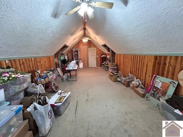 5812 State Route 123, Arlington, KY 42021 - bonus room featuring ceiling fan, wooden walls, lofted ceiling, and a textured ceiling
