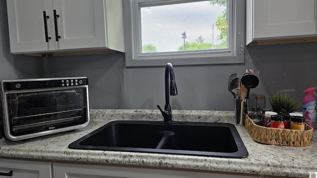 175 Jefferson, Cadiz, KY 42211 - kitchen view of a sink and white cabinetry