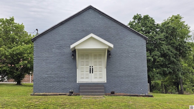 175 Jefferson, Cadiz, KY 42211 - view of front of home featuring entry steps, a front lawn, and brick siding