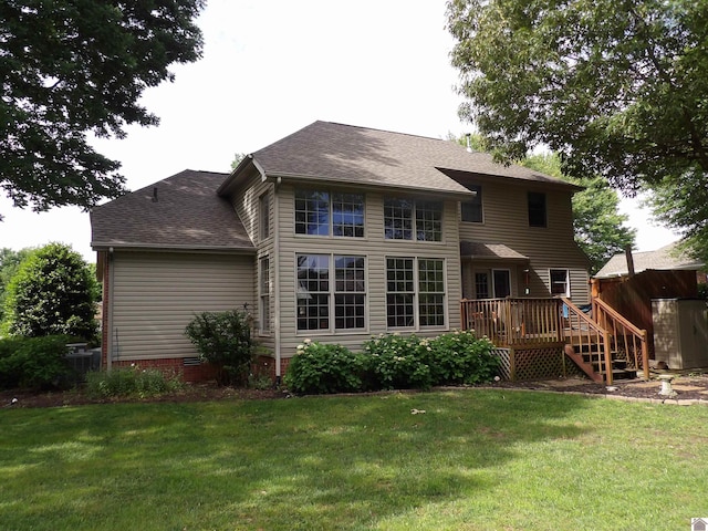 145 Stonecreek Pl, Paducah, KY 42003 - rear view of house featuring a wooden deck, a yard, and a shingled roof