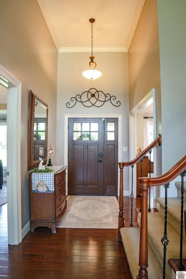 145 Stonecreek Pl, Paducah, KY 42003 - foyer entrance with wood-type flooring, crown molding, stairway, baseboards, and a high ceiling