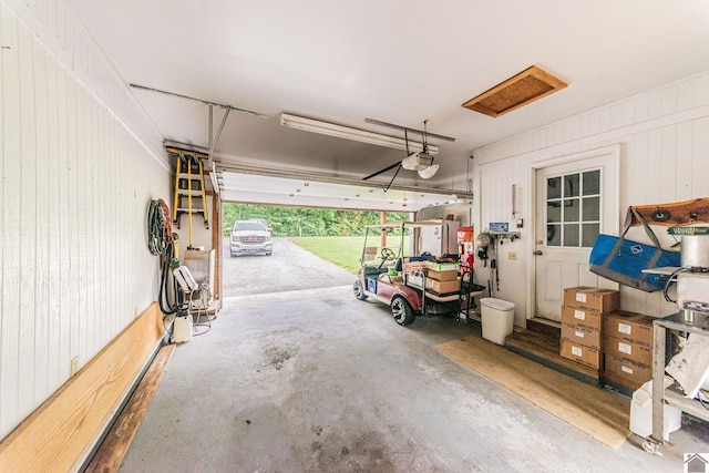 827 State Route 1271, Kuttawa, KY 42055 - garage featuring a garage door opener