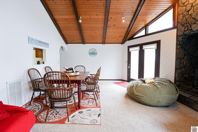 251 Hickory Hill Ln, Benton, KY 42025 - carpeted dining space featuring wood ceiling with exposed beams, high vaulted ceiling, baseboards, and a fireplace