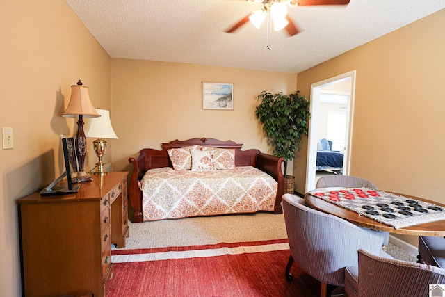 251 Hickory Hill Ln, Benton, KY 42025 - bedroom featuring a textured ceiling and a ceiling fan