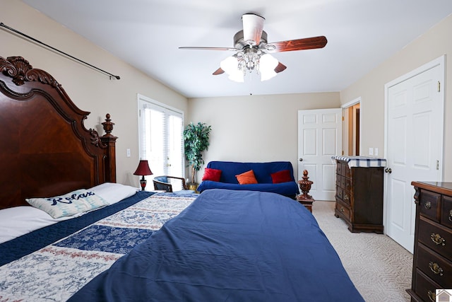 251 Hickory Hill Ln, Benton, KY 42025 - bedroom with light colored carpet and ceiling fan