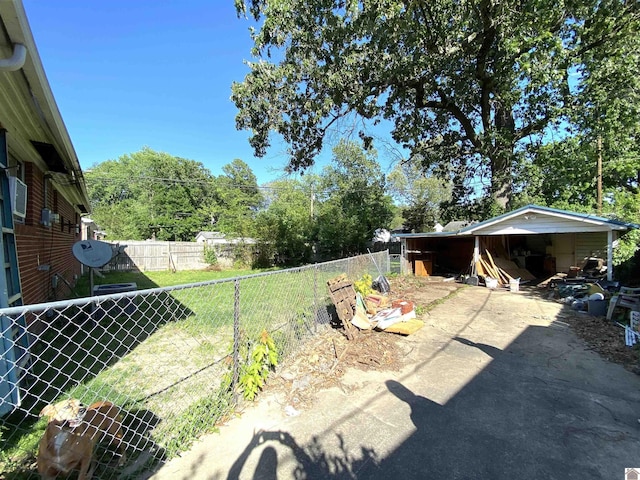 2222 Harrison St, Paducah, KY 42001 - view of yard featuring a carport