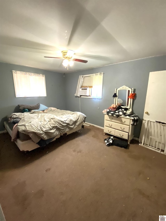 2222 Harrison St, Paducah, KY 42001 - carpeted bedroom featuring baseboards, cooling unit, and ceiling fan