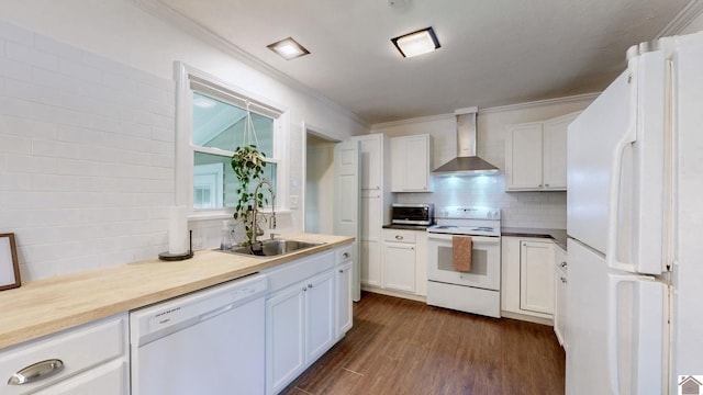 1916 Monroe St, Paducah, KY 42001 - kitchen with white appliances, wall chimney exhaust hood, a sink, dark wood finished floors, and white cabinets