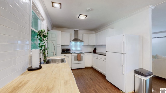 1916 Monroe St, Paducah, KY 42001 - kitchen with white appliances, wall chimney range hood, a sink, crown molding, and white cabinets