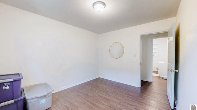 1916 Monroe St, Paducah, KY 42001 - empty room with wood finished floors and baseboards