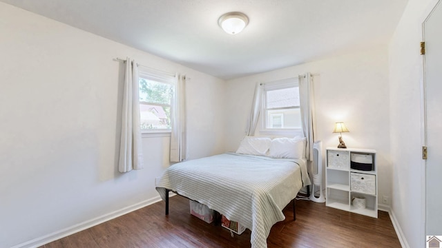 1916 Monroe St, Paducah, KY 42001 - bedroom featuring wood finished floors and baseboards