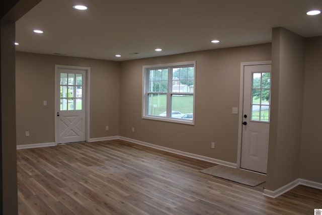 1400 Walnut St, Benton, KY 42025 - foyer featuring healthy amount of natural light, wood finished floors, baseboards, and recessed lighting