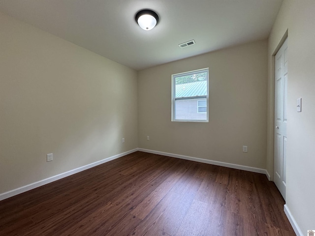 110 Dawson Rd, Princeton, KY 42445 - unfurnished bedroom featuring dark wood-type flooring and baseboards