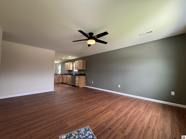 110 Dawson Rd, Princeton, KY 42445 - unfurnished living room featuring dark wood-style floors, baseboards, and ceiling fan