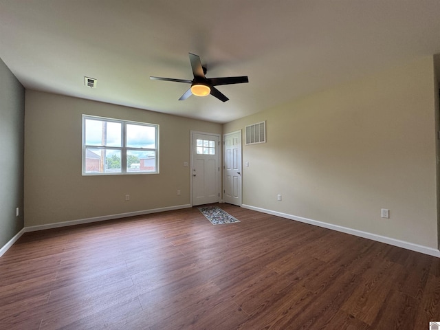 110 Dawson Rd, Princeton, KY 42445 - foyer entrance with dark wood-style flooring, a ceiling fan, and baseboards