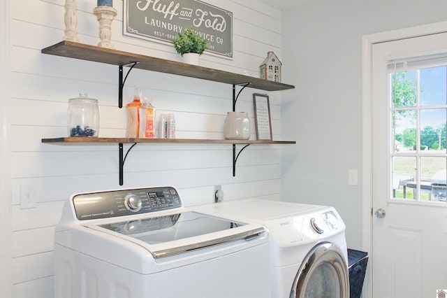 756 Utterback, Murray, KY 42071 - laundry area with washing machine and clothes dryer and wood walls
